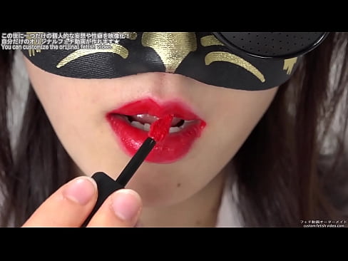 A woman who kisses glass by painting lipstick