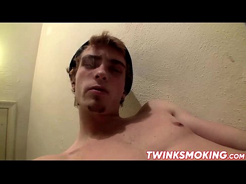 Cute Scottie Cooper enjoying his smoke while jerking cock