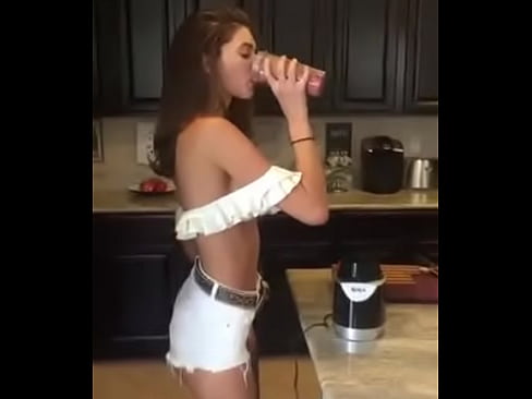 Hot model makes an early smoothie