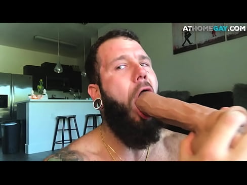 Bearded athlete masturbates with a big toy for jizz
