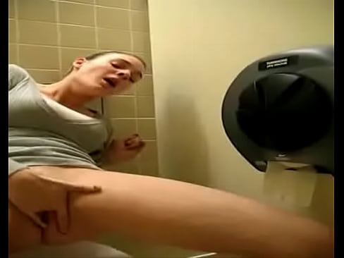 Busty teen fingering herself in public toilet