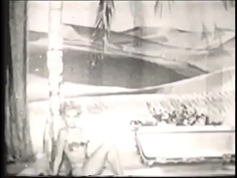 Cute blonde takes a bath in an old movie