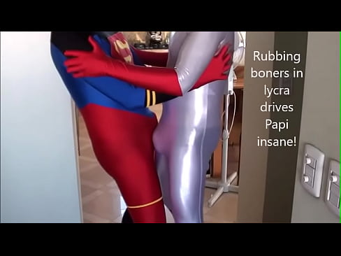 Papi goes insane rubbing bulges in lycra with his Super hero buddy!