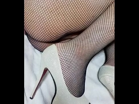 Asian CD masturbates in fishnet stockings and high heels