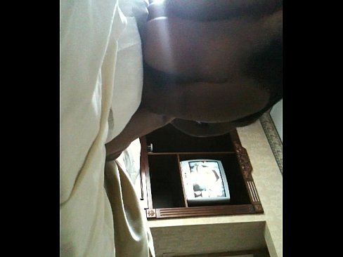 Black couple getting it in a hotel.