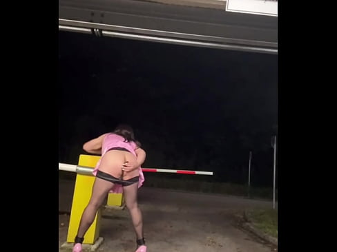 Sissy playing in public parking lot