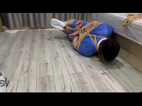 Asian boy hogtied and struggle