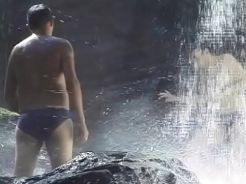 Two gay guys by the waterfall