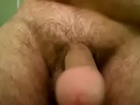 Horny limp cock getting knocked around by dowel stick
