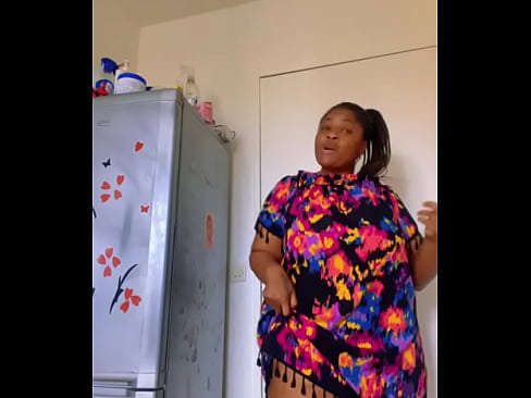 Afro Getty lifts her dress to show some skin