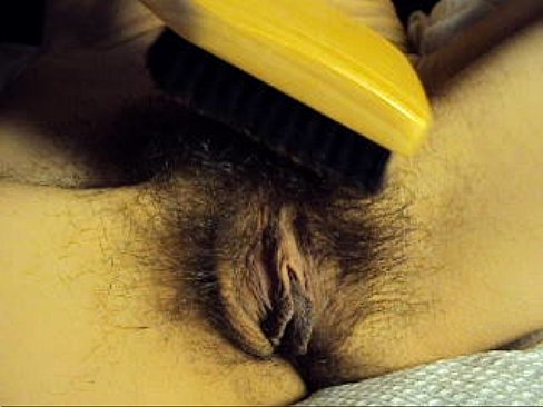 My wife brushing her hairy pussy