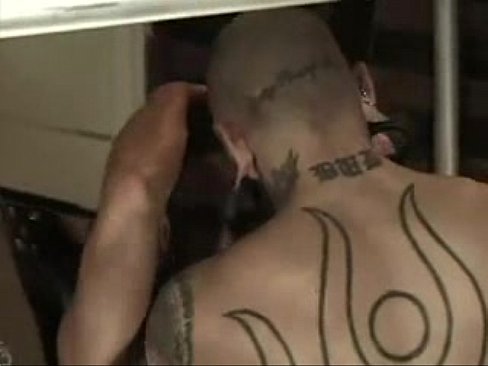 Pierced guy with heavy tattoos