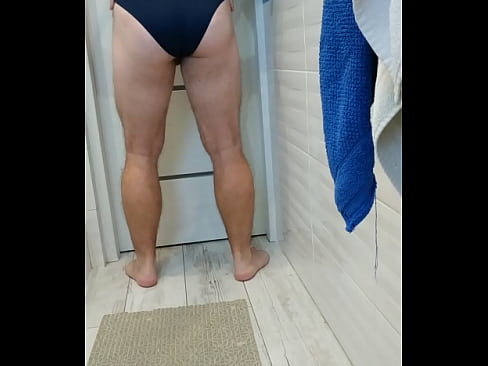 Boy wearing one piece swimsuit