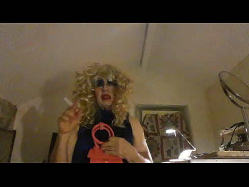 Cross-dresser smokes for you to masturbate and cum over