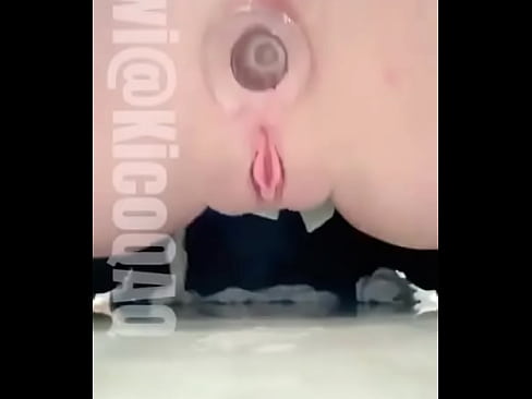 Satisfying herself using buttplug