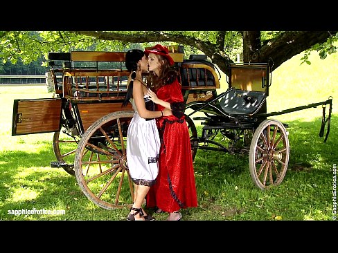 Classic p. lesbians Juliette and Ashley have fun by the wagon