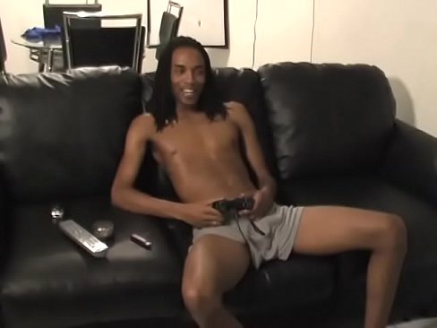 Long haired black thug masturbates on sofa