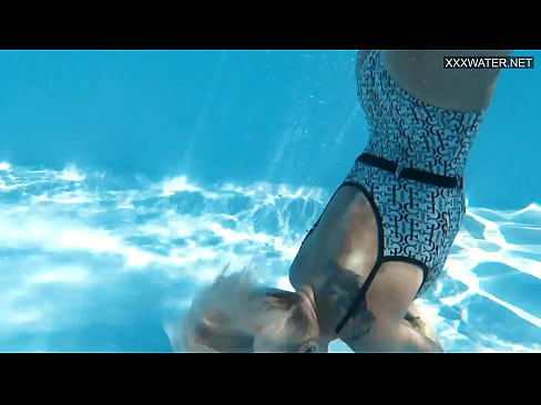 Beautiful blonde Zazie Skymm swims nude