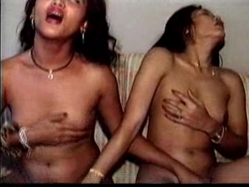 Two hot Asian Ladyboys enjoy light bondage and licking and sucking.