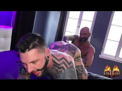 Tattooed fisting power bottom, Teddy Bryce, gets fisted for Studfist