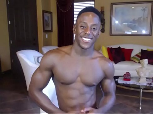 Muscular black guy shows his dick