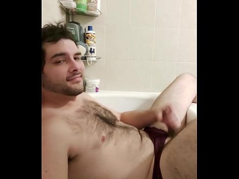 Jerking off in the tub before cumming on my face