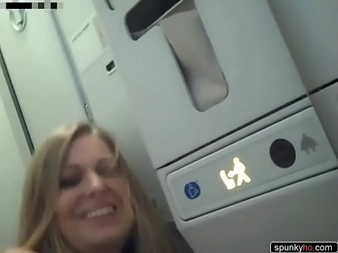Kinky couple have sex in a plane