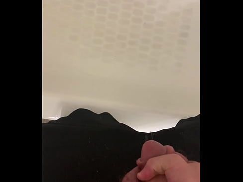 Pissing into the shower while holding my big sack