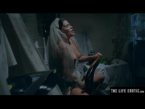 Pulling up her tattered wedding dress and rubbing her wet pussy