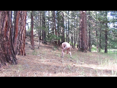 Naked in the forest.