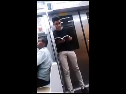 Horny young guy reading a book