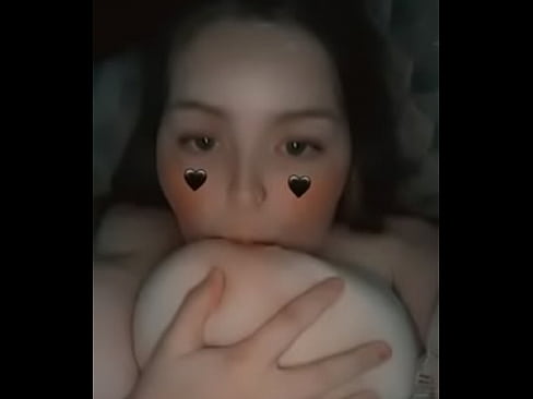 Girl sucks on her own MASSIVE breasts