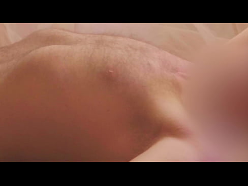 Lying nude in the morning sunlight, panning from head to toe, cinematographic