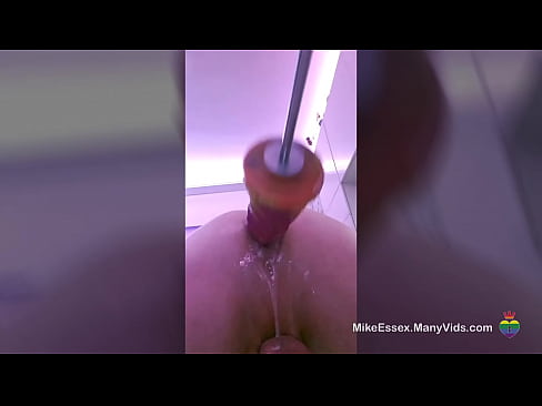 Mike Essex takes the huge Beastli dildo in the ass while locked in chastity