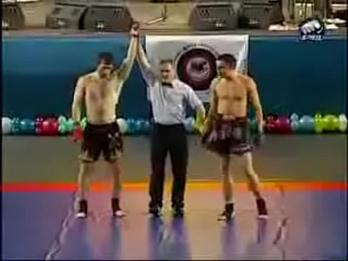 The winner is dancing russian dance 'Lezginka" after fight