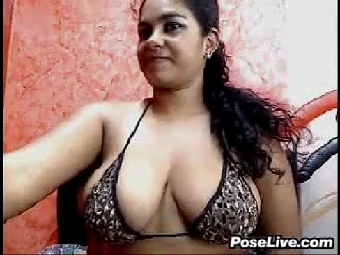 Chubby Girl Teasing Her Large Breasts