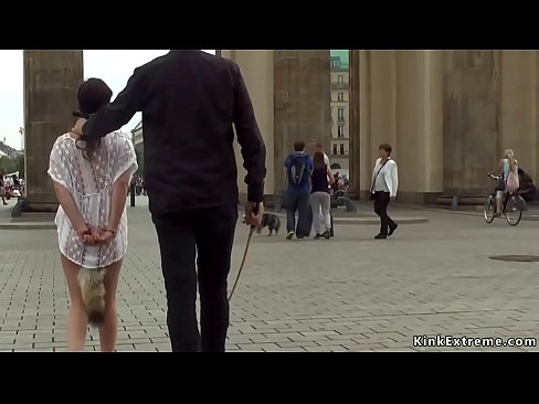 Hot petite Euro brunette babe Juliette March with tail butt plug and gagged d. and walked and caned in public street