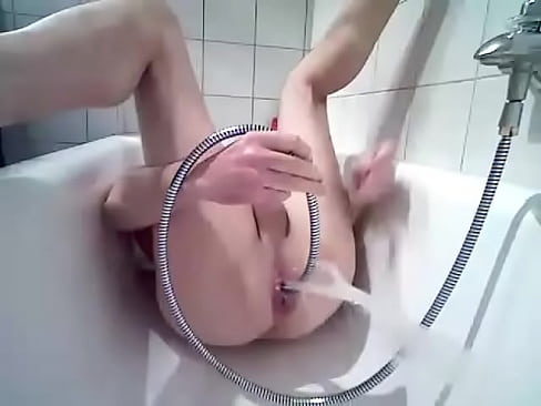 Enema, belly with anal water inflating under pressure