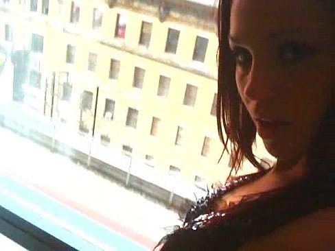 Nyli Summer teases in front of a window for all her fans in NYC.