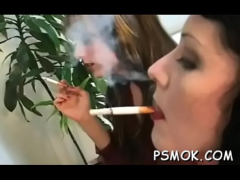 Elegant chick smokes a cig
