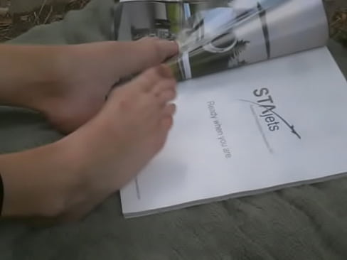 Flipping Through Magazine with Feet