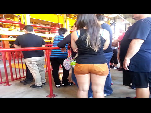 Big butt in orange shorts