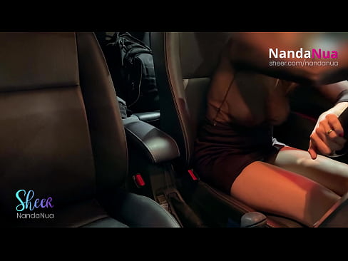 NandaNua teasing the gas station attendant by flashing her tits using a transparent blouse