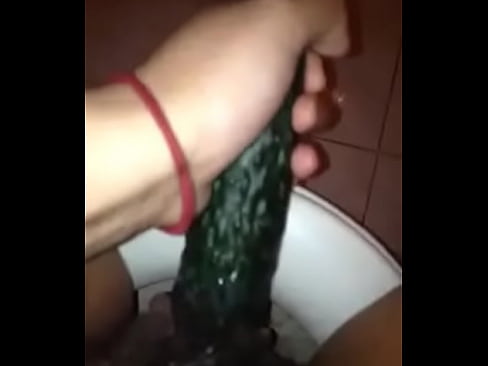 girl masturbathing with cucumber