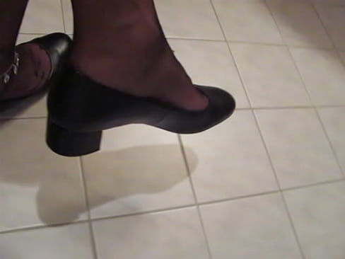 French Secretary loves to show her new leather pumps