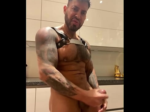 Latino gay pornstar in harness and leather panties in the kitchen fingering my cock - VIKTOR ROM -