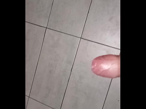 Cumshot in public bathroom floor in public