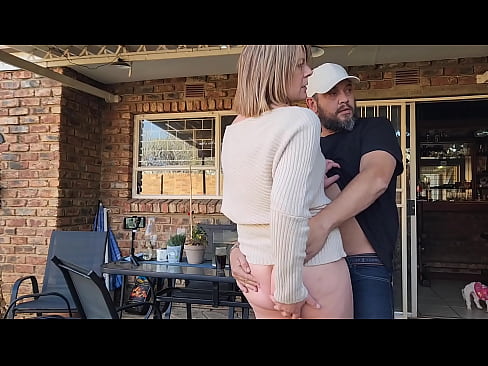 Fucking his wife on the patio