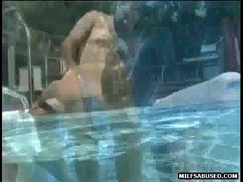Brunette babe gets fucked and sucks cock in a pool