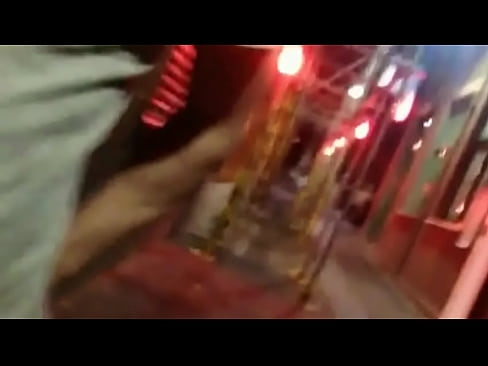 pissing on the streets at night with people walking by